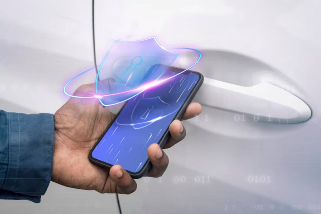 A hand holding a smartphone with a digital lock icon, poised near a car door handle, illustrating mobile vehicle access technology.
