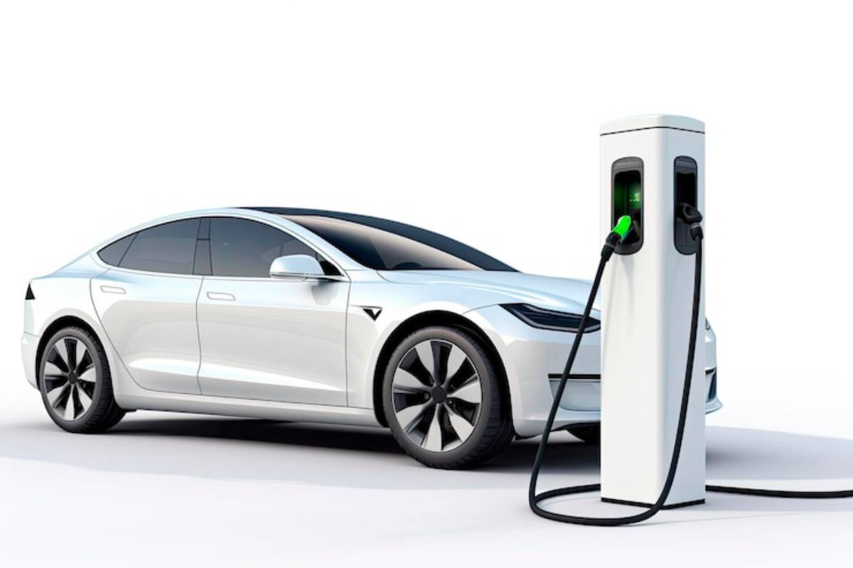 A sleek white electric car is charging at a modern charging station, with visible charging cables and illuminated indicator lights.